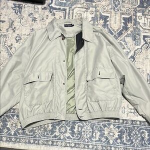 Gray Windbreaker Jacket with Front Zipper and Classic Cut